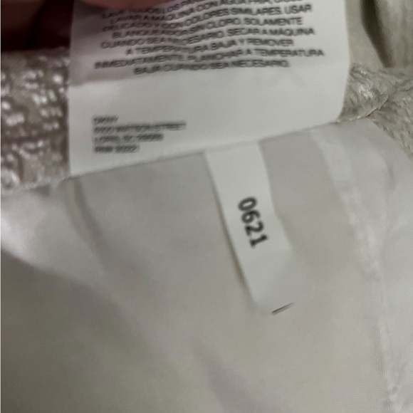 4- DKNY: 108” Pleated drapes with accent buttons Champagne. Like New! - Picture 6 of 11